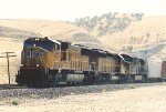 Westbound manifest eases down the grade